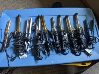 Professional curling irons all different sizes and brushes