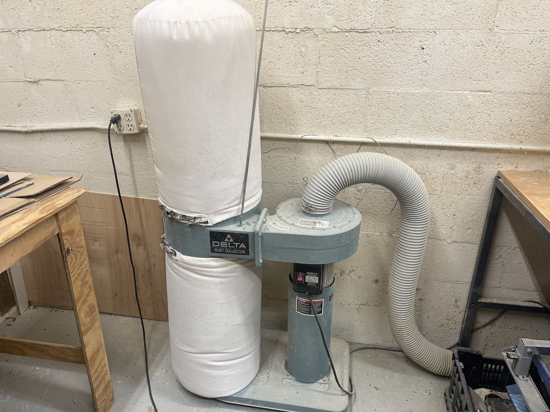 Separate shop vac one horsepower 5 inch 15 foot of hose Rech cleanable upper and lower bag 110 V ready to go