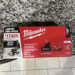 New Milwaukee M12 battery w/ charger 5.0 High output