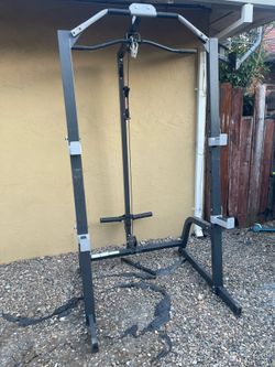 Squat rack cable machine pulley system pull up bar