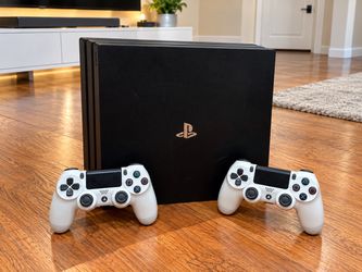 Sony PlayStation 4 Pro with Two Controllers