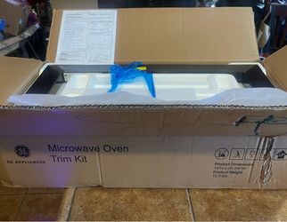 NEW BLACK MICROWAVE FRAME.
