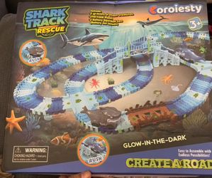 New in box eoroiesty shark track rescue glow in the dark