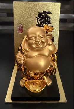 Golden Laughing Buddha Statue Symbolizing Wealth and Happiness