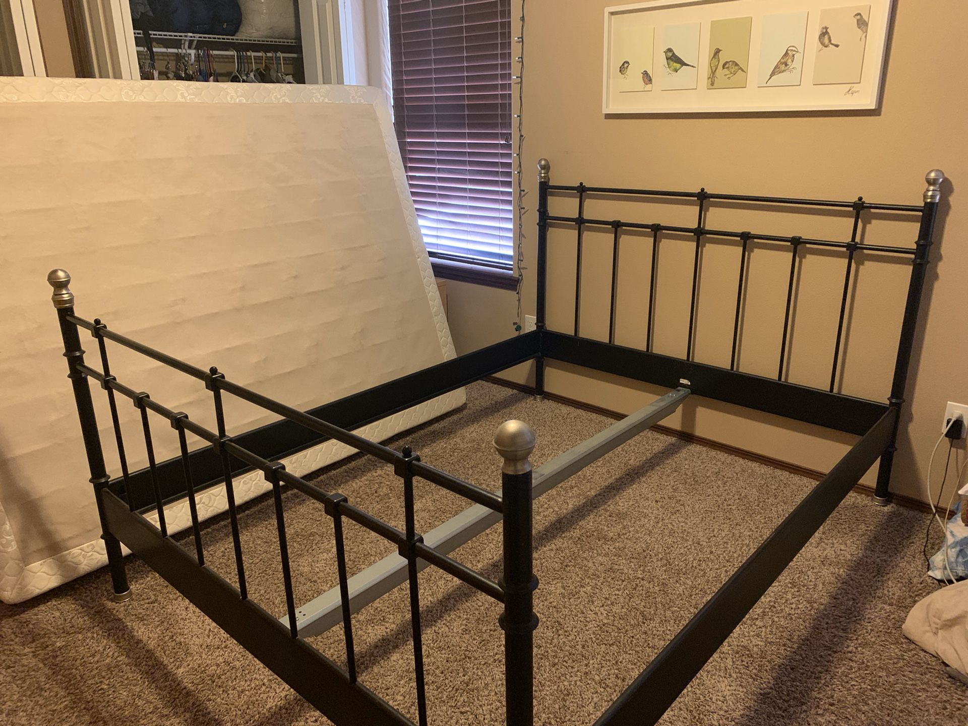 Queen sized metal bed frame with headboard and footboard, great condition, includes middle support