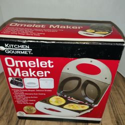 KITCHEN GOURMET ELECTRIC OMELET MAKER WHITE SW-086. Packaging has some wear from age and storage. Sold as is.
