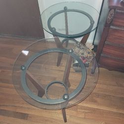 set of Glass round end tables 