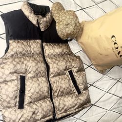 Coach Hat And Sleeveless Puff Jacket 