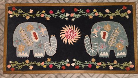 Embroidered picture of two elephants