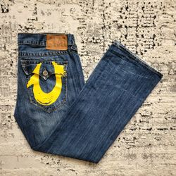 TRUE RELGION BAGGY YELLOW HORSE SHOE JEANS 