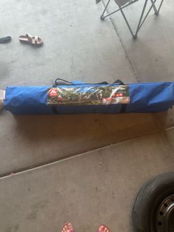 Ozark Trail 10' x 10' Instant Slant Leg Canopy in blue.