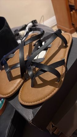 Black sandals with Chris cross straps