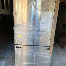 New Refrigerator (has A Dent)