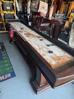 Used shuffleboard table
