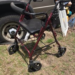 Nice Walker With Seat And Hand Brakes Only $50 Firm