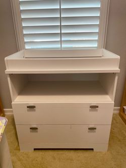 Diaper changing table with drawers