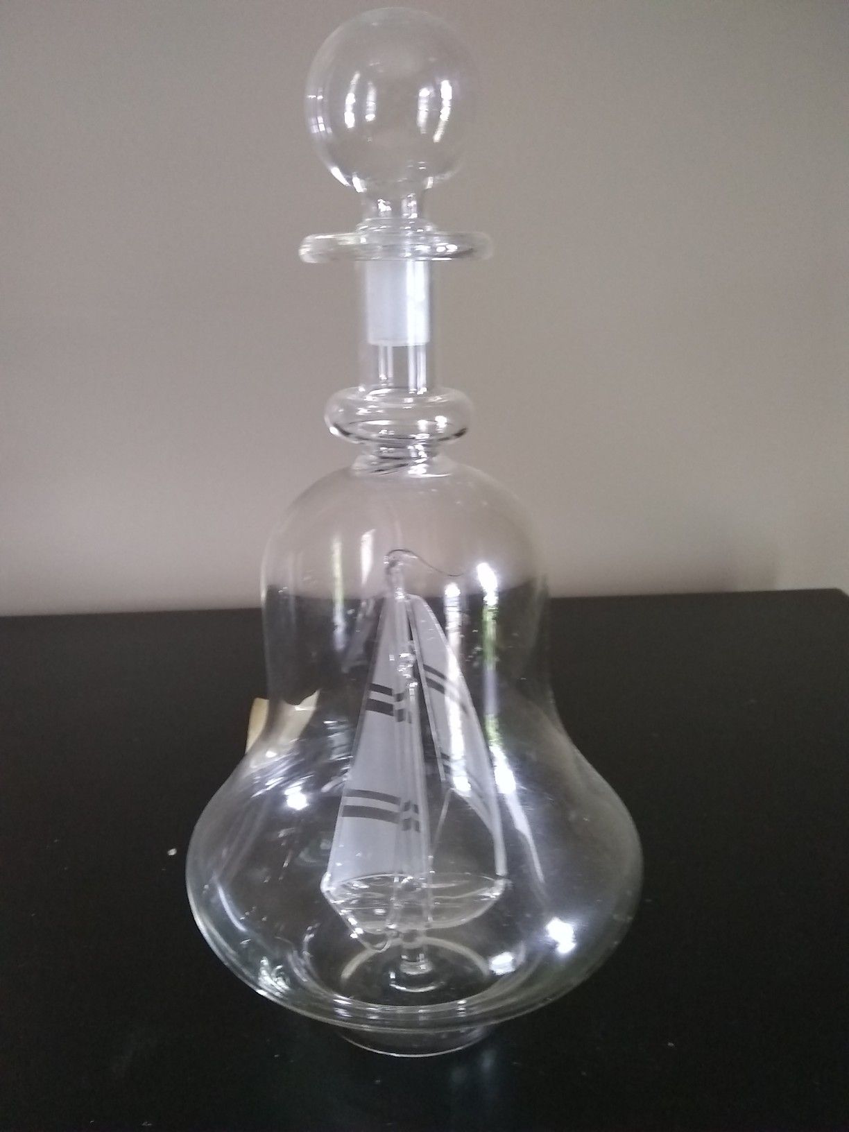 Glass sailboat in a bottle