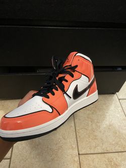 air jordan 1s mid se “turf orange”