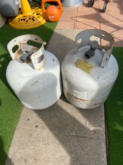 Empty propane tanks each