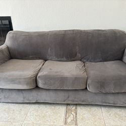 Couch with grey covers