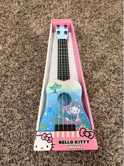 Collectible hello kitty toy ukulele