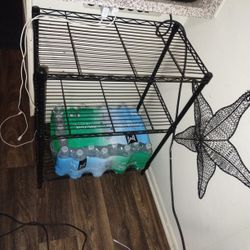 Solid Metal Shelf With Three  Shelves 31 In Tall 23 And 1/4 In Wide The 13 And A Half Inches Depth 