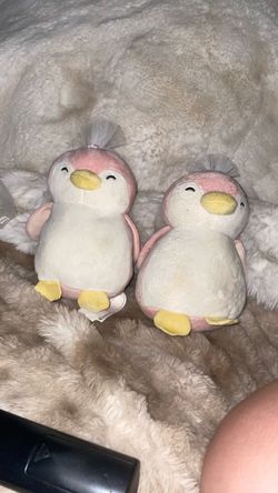 2 pink bride penguins