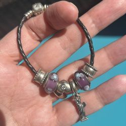 Pandora braided leather charm bracelet with charms