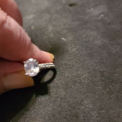 Size 6 silver ring with cubic zirconia stone. .
