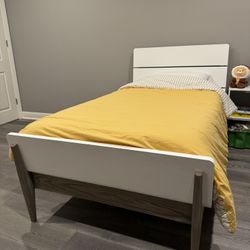 The Land of Nod Twin Bed Frame + Purple Twin Mattress