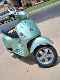 Vespa Scooter in Metallic Green