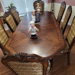 Dinning table/8 chairs  $2000.OBO