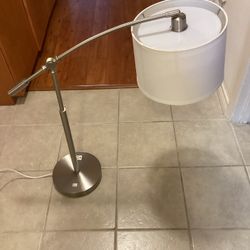 Beautiful Modern Table Lamp With Brushed Nickel  Finish and Fabric Drum  Shade. Shade Size :  11”Diameter-  Base Size : 9”Diameter-27” Tall.