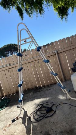 Pool ladder and pool pump