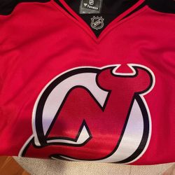 NJ devils Women’s Hockey Jersey Size Medium- New With Tags