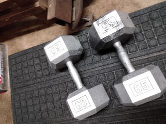 One 60 lb. dumbbell and one 65 lb. dumbbell