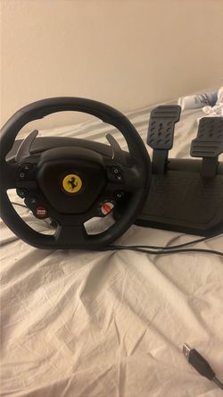 a Thrustmaster T80 Ferrari 488 GTB Edition Racing Wheel