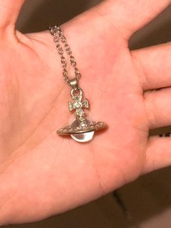 vw silver saturn necklace