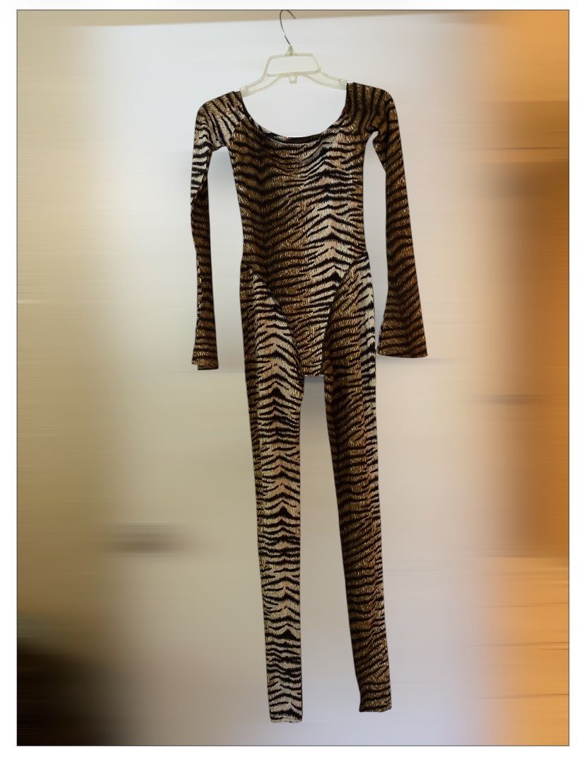 NEW Woman’s clothes in the Small size ONLY, One piece - Full Body - Leopard Print in plastic bag