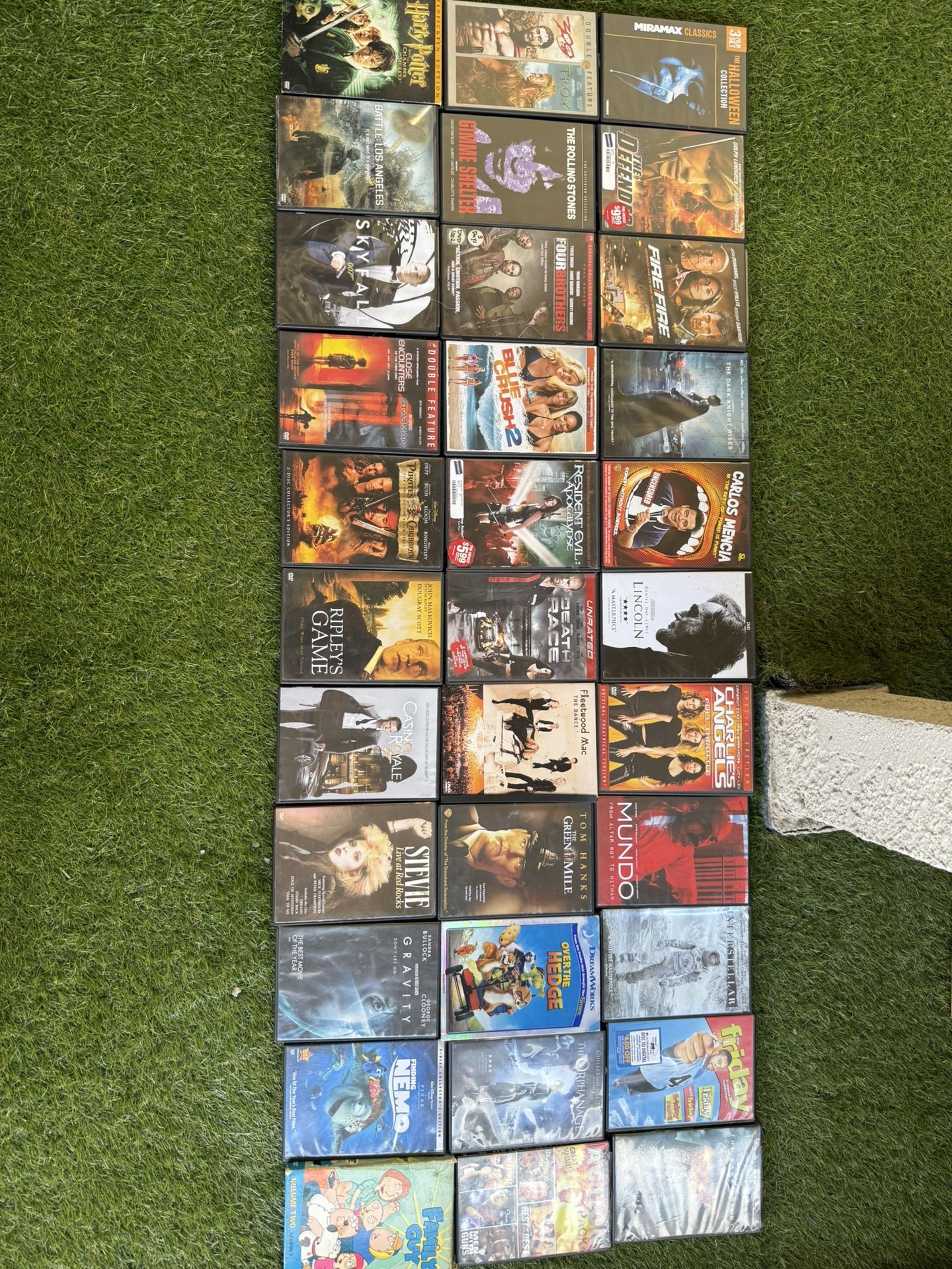 Lot Of 173 DVDs And Two VHS Cassettes 