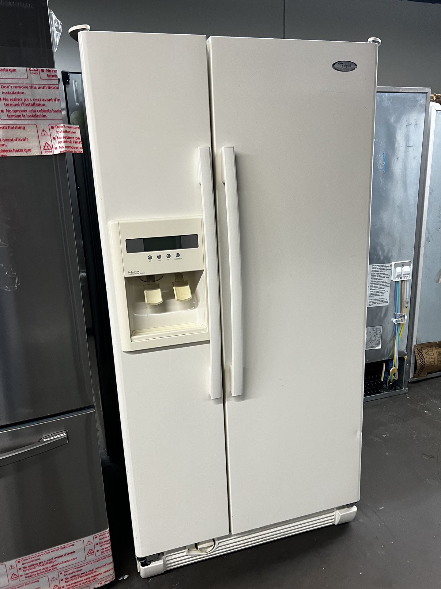 Whirlpool 33”Wide Side by Side Refrigerator In Almond Color 