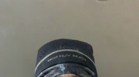 Beanie or B22 Dior shoes in photo with bike