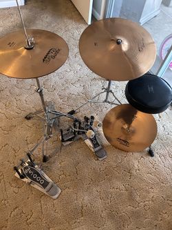 Assorted drum hardware and cymbals