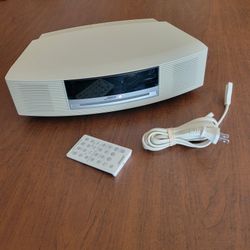 Bose Wave Music System CD Player AM/FM Radio Model AWRCC2. Comes with 
remote control. Pre-owned, in great working and cosmetic shape. 
Functionality 