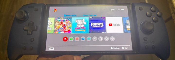 Nintendo switch oled ( 2 digital games included )