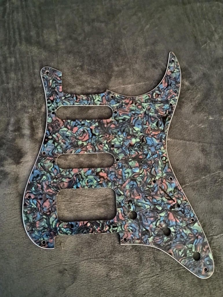 11 Hole Strat Pick guard For A Stratocaster.