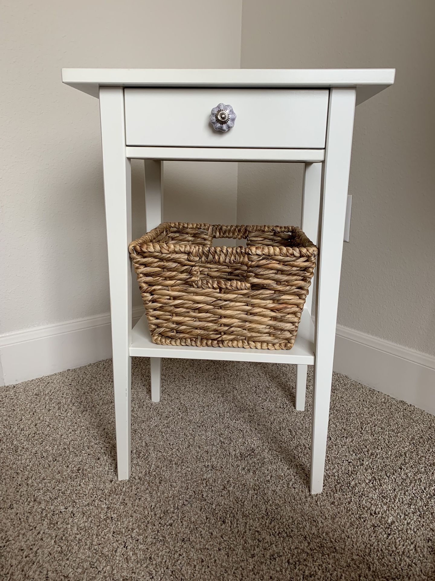 White end table with woven basket