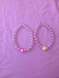 Cute matching bracelets  pink and yellow