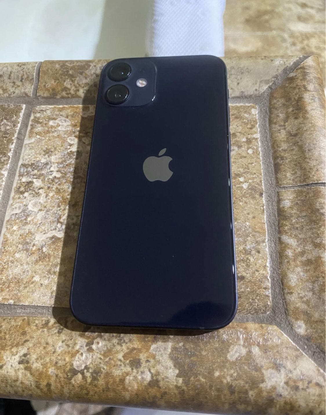 Iphone 12 mini 64gb factory unlocked works excellent with Tmobile Metro