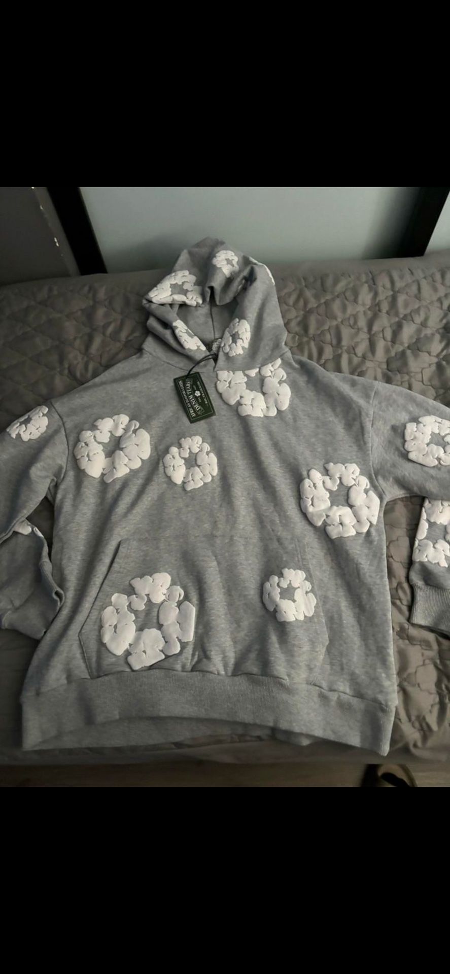 grey denim tear